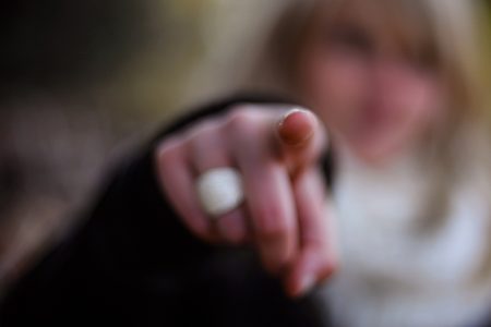 Woman, pointing finger
