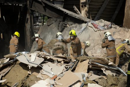 Firefighters remove debris, Kremenchuk