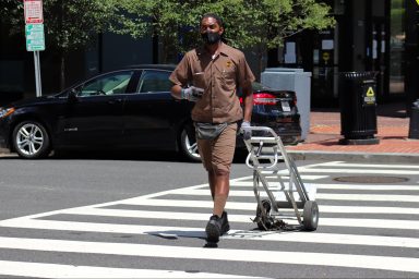US labor, Teamsters, UPS, delivery, logistics, tentative pact