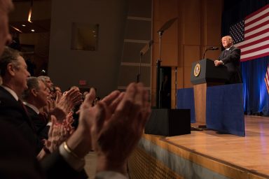 Donald Trump, behind podium