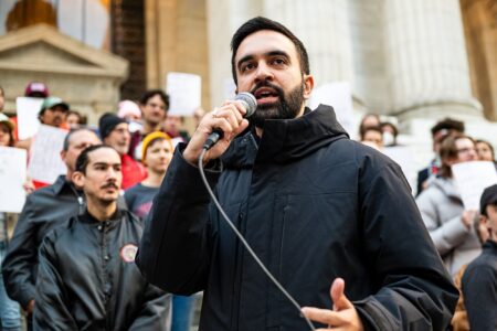 Zohran Mamdani, microphone, speaking